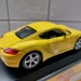 Коллекционная модель Porsche Cayman S 1:32 Bburago