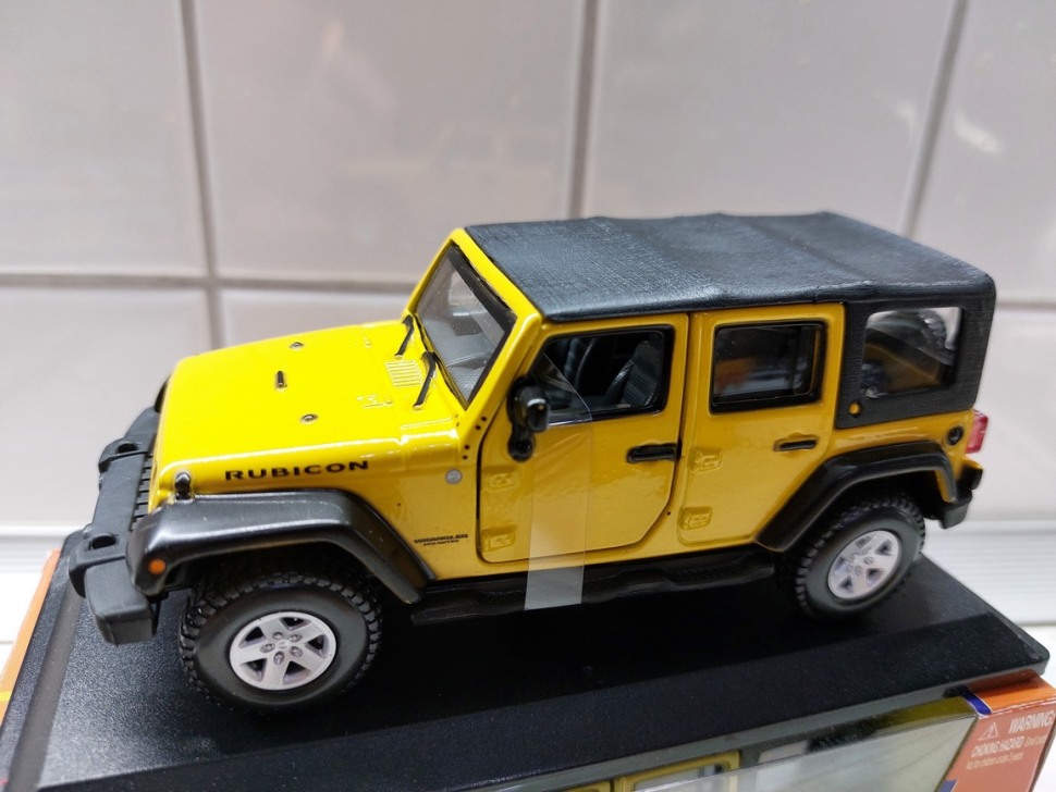 Коллекционная модель Jeep Wrangler Unlimited Rubicon 1:32 Bburago