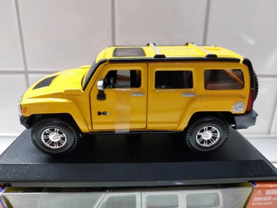 Коллекционная модель Hummer H3 1:32 Bburago