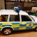 Коллекционная модель Range Rover Security Team 1:24 Bburago